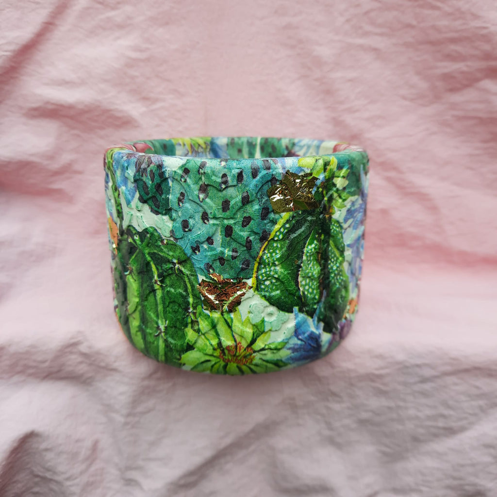 Macetero cemento con decoración decoupage